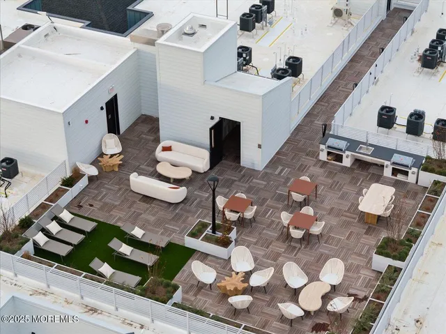 a view of a terrace with furniture