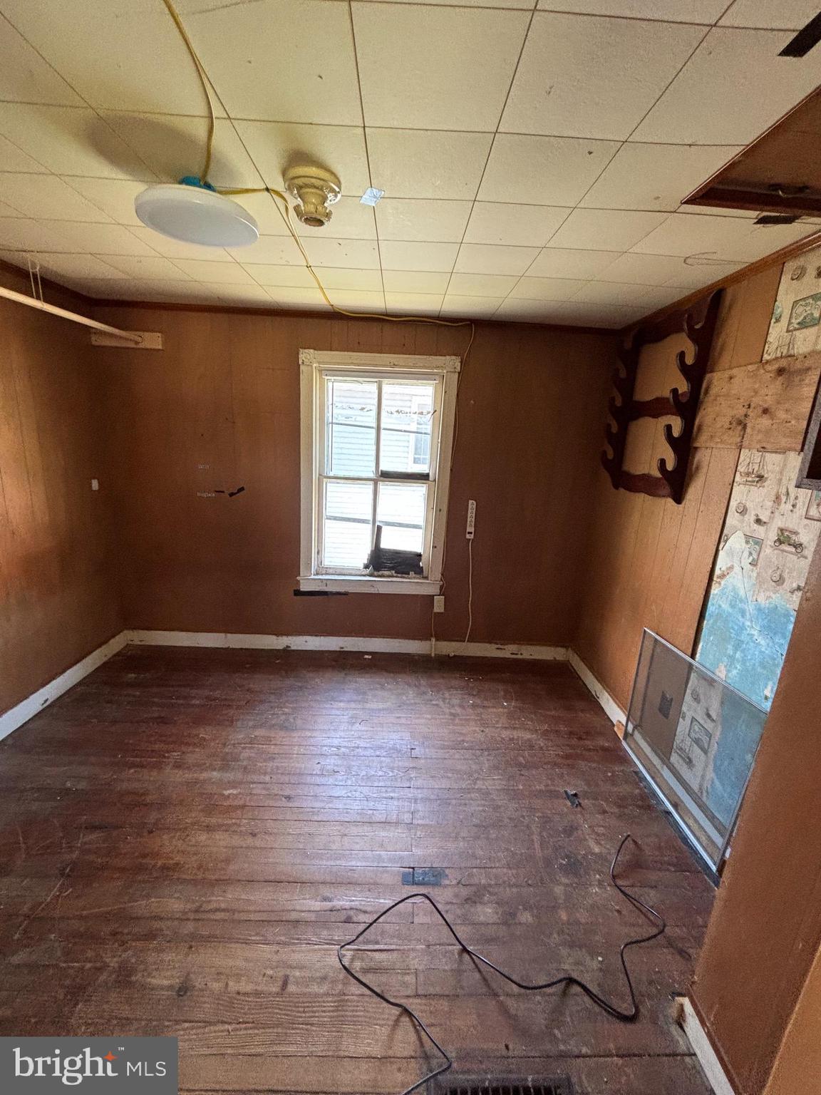 21447 East Sharp Street Rock Hall, MD 21661 - Photo 13 of 14 an empty room with windows