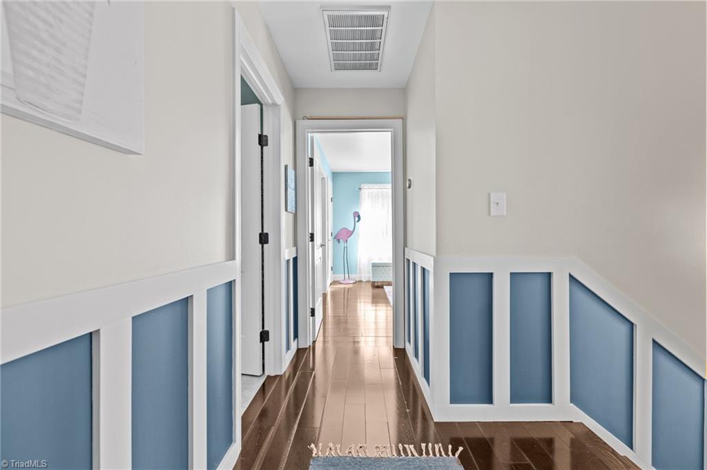 3930 Cole Avenue High Point, NC 27265 - Photo 23 of 44 Upstairs hallway with beautiful moldings, hardwoods.