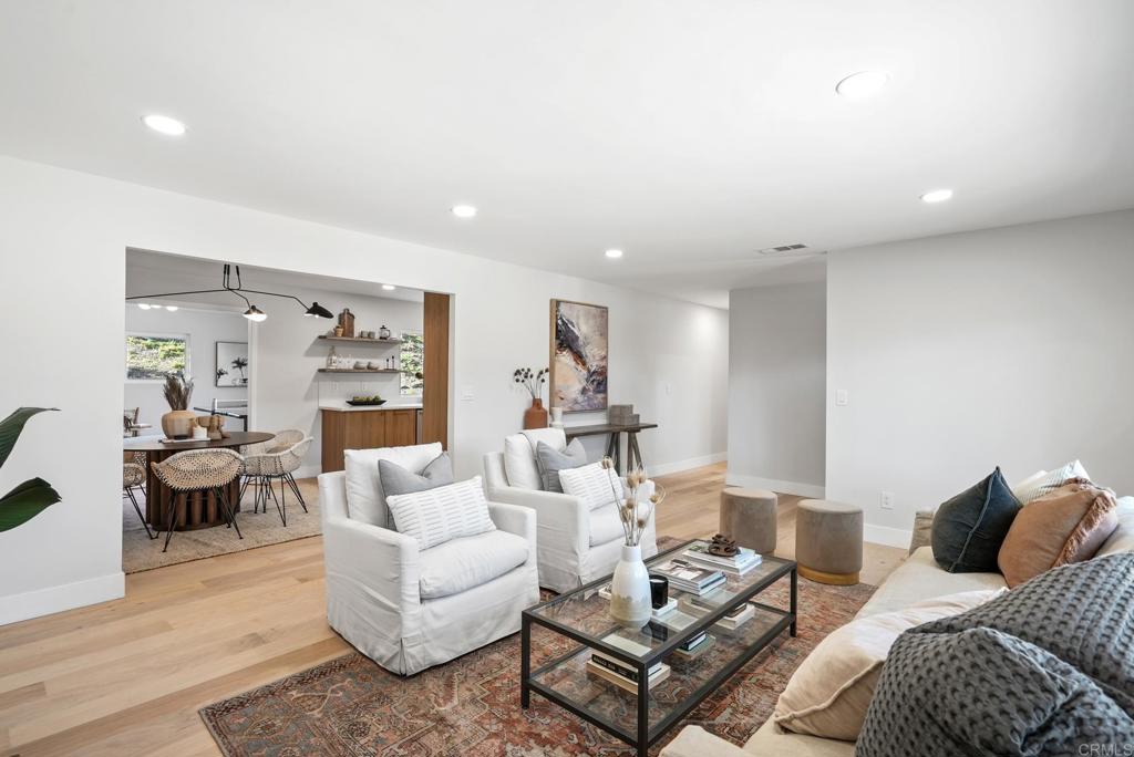 5898 Agee Street San Diego, CA 92122 - Photo 11 of 40 a living room with furniture or couch and a wooden floor
