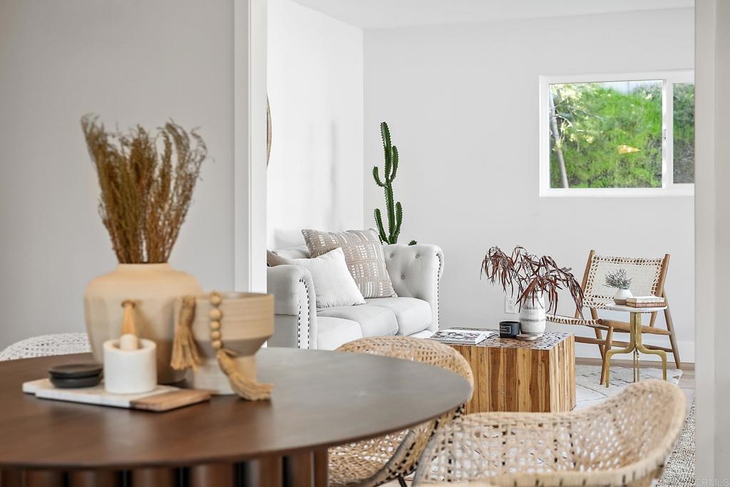 5898 Agee Street San Diego, CA 92122 - Photo 20 of 40 a living room with furniture and a large window