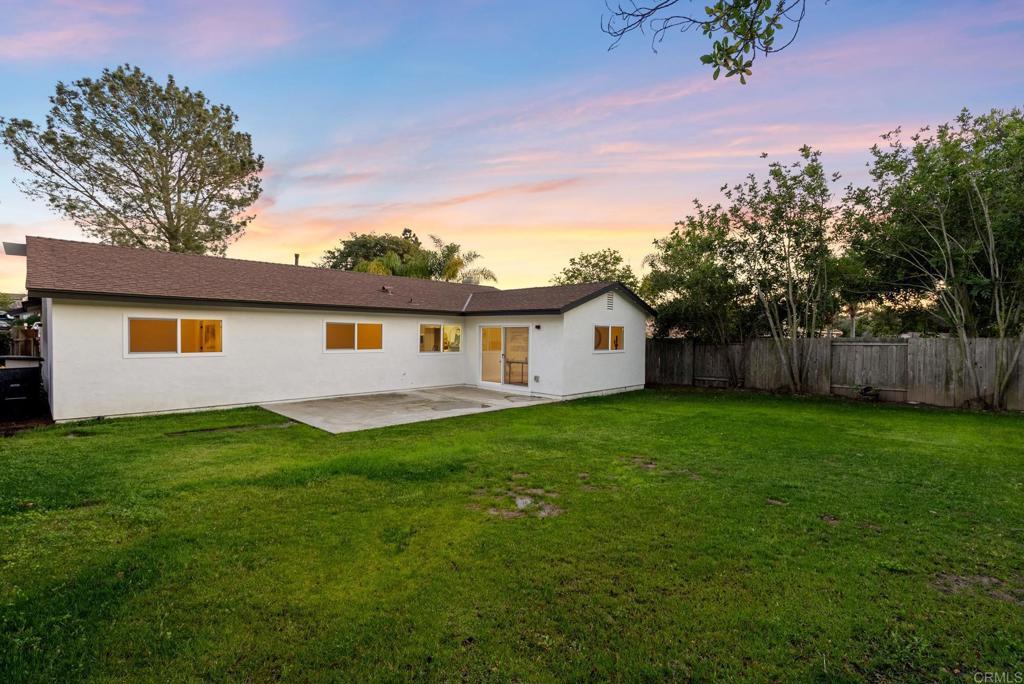 5898 Agee Street San Diego, CA 92122 - Photo 23 of 40 a view of a yard with a house