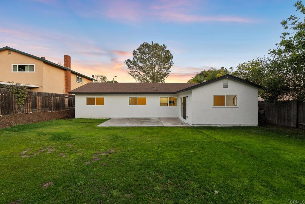 5898 Agee Street San Diego, CA 92122 - Photo 24 of 40 a view of a yard with a house