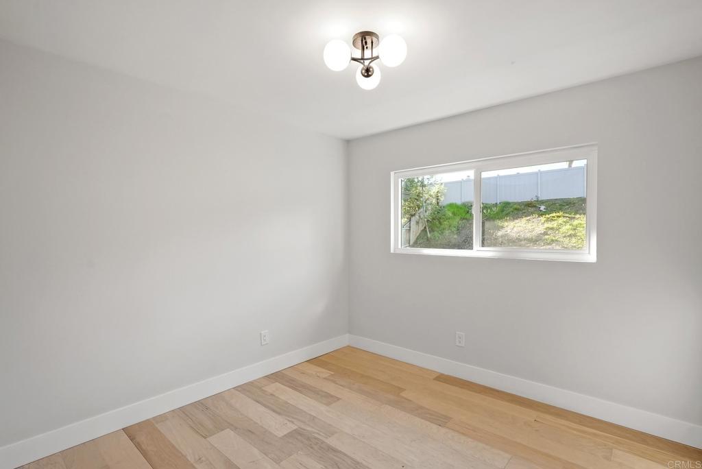 5898 Agee Street San Diego, CA 92122 - Photo 34 of 40 an empty room with a window