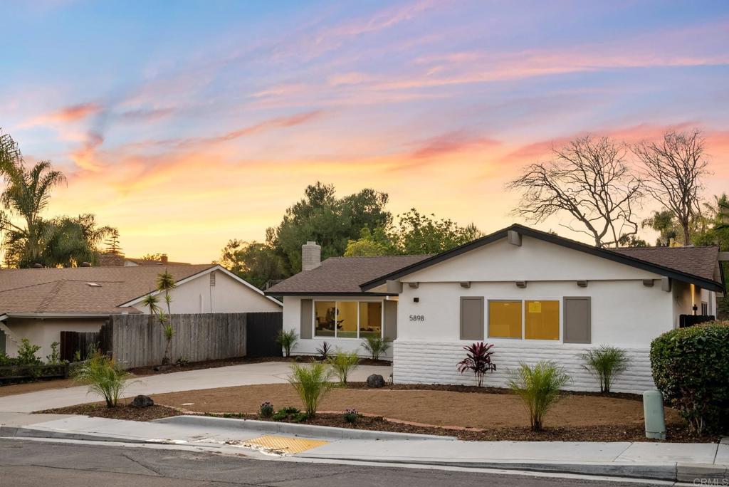 5898 Agee Street San Diego, CA 92122 - Photo 37 of 40 a front view of a house with garden