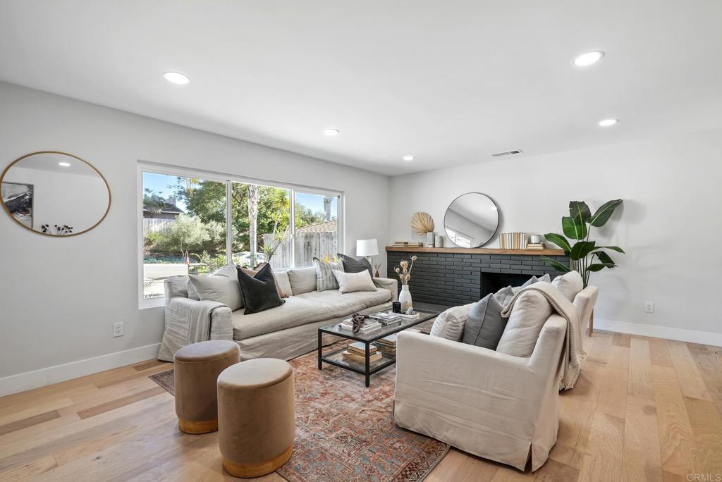 5898 Agee Street San Diego, CA 92122 - Photo 6 of 40 a living room with furniture and a large window