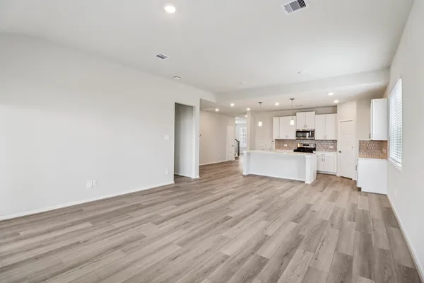 a view of kitchen with wooden floor