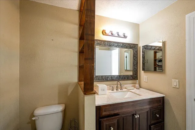 a bathroom with a sink and a toilet
