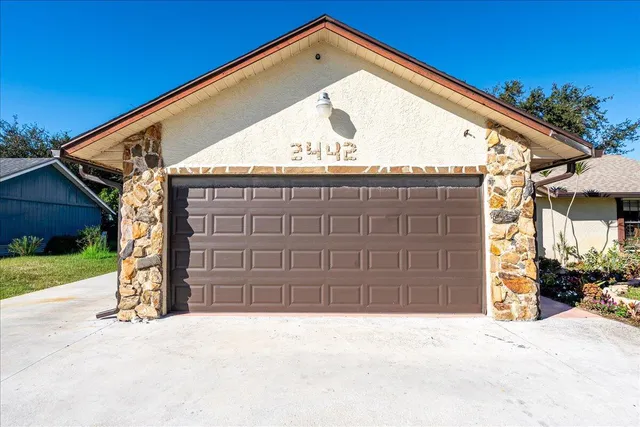 a view of outdoor space and front view of a house