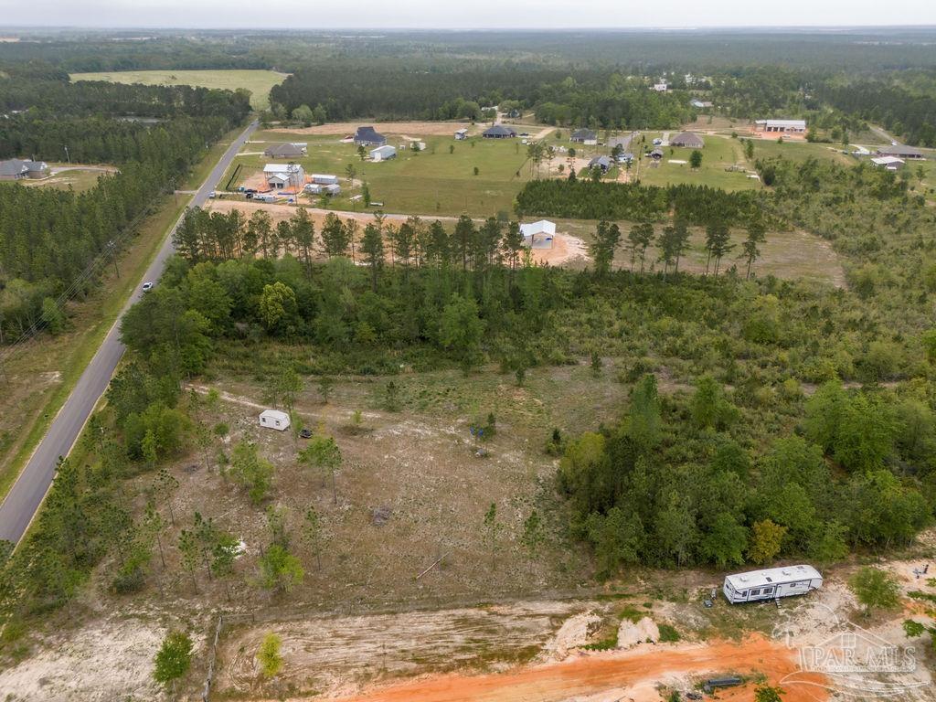 7706 Tidwell Road Pace, FL 32571 - Photo 15 of 25 a view of a lake view