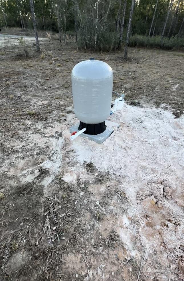 7706 Tidwell Road Pace, FL 32571 - Photo 4 of 25 a view of a backyard