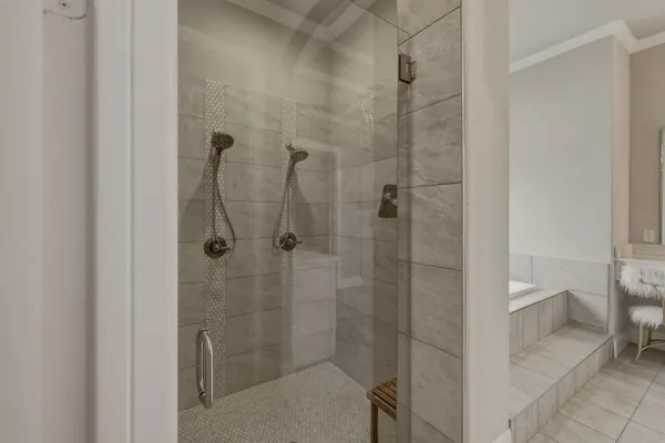 a bathroom with a shower and toilet