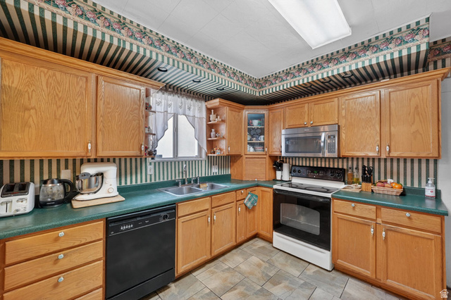 977 23rd Street Ogden, UT 84401 - Photo 14 of 29 Kitchen with electric range, open shelves, black dishwasher, wallpapered walls, and stainless steel microwave