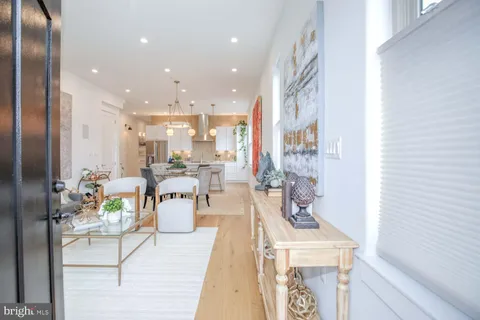 a view of a kitchen and dining room