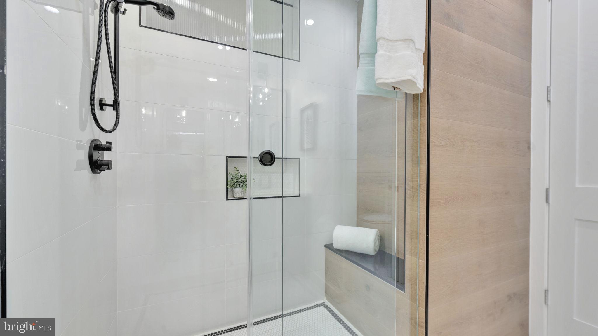 1528 Oates Street Northeast, Unit 1 Washington, DC 20002 - Photo 34 of 54 a bathroom with a shower