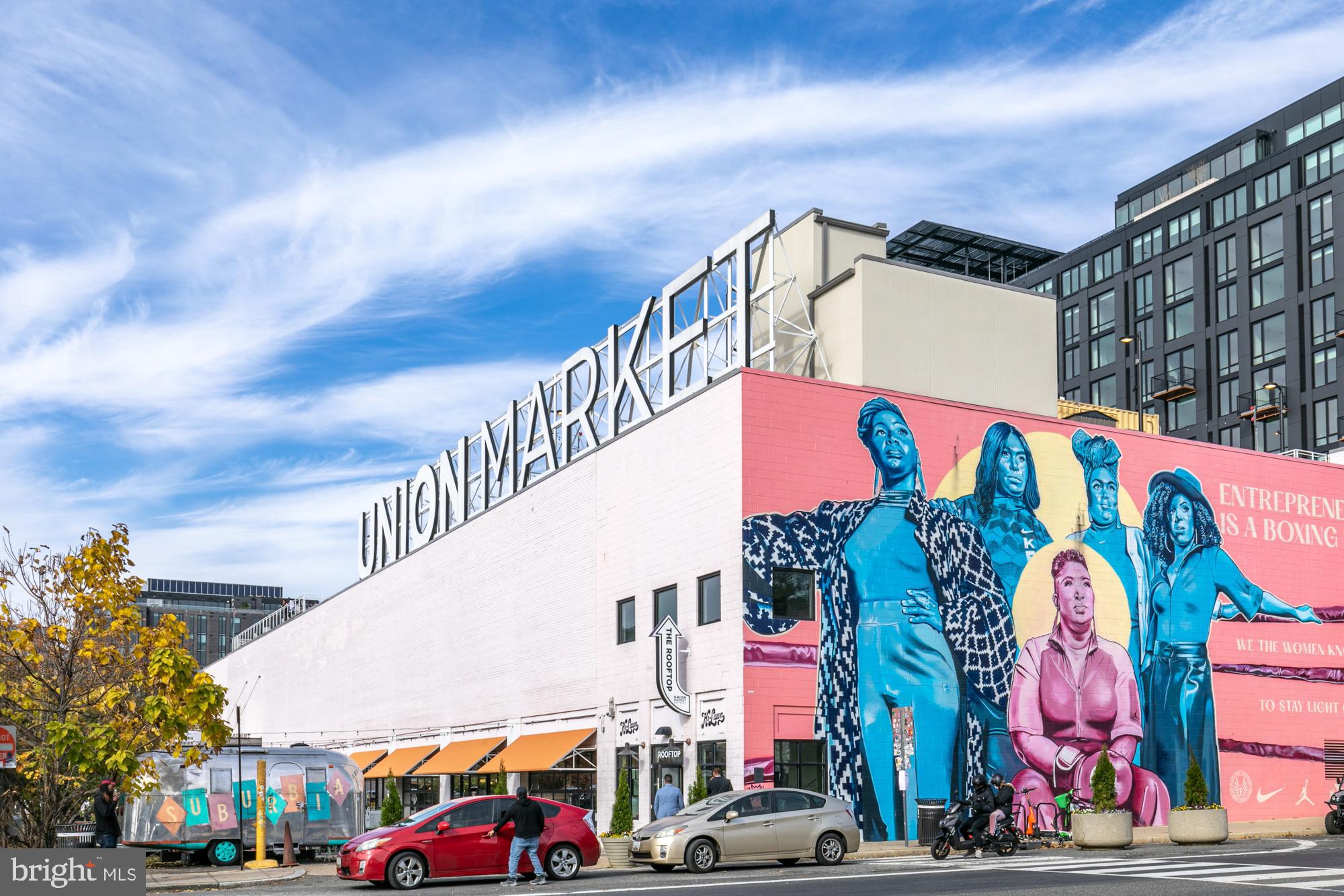 1528 Oates Street Northeast, Unit 1 Washington, DC 20002 - Photo 45 of 54 a view of building with sign board