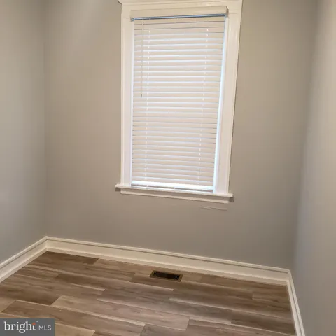 a brick building with a sink