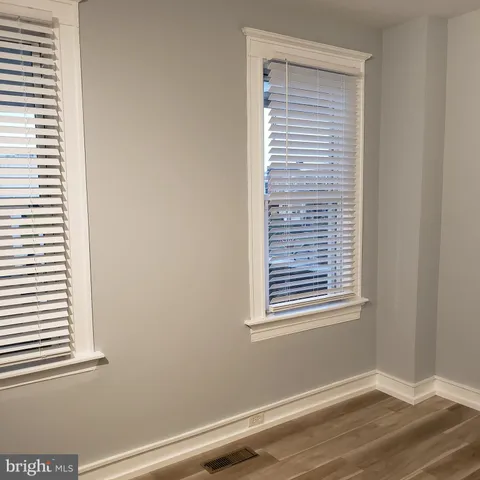 a view of a room that has a window in it
