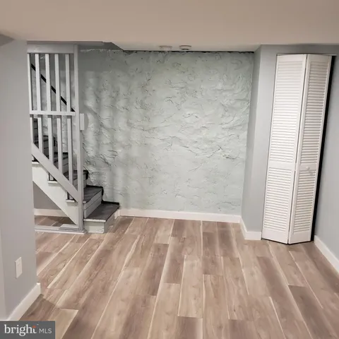 a bathroom with a sink a mirror and vanity