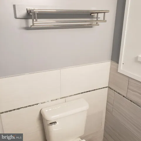 a front view of a house with parking space