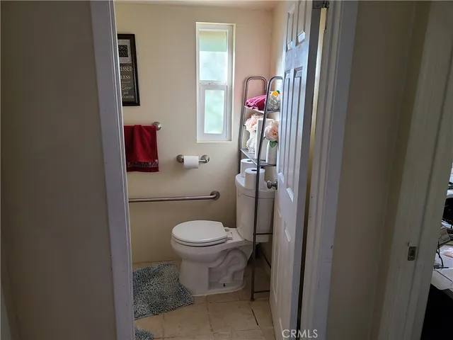 a bedroom with a bed and a cabinets