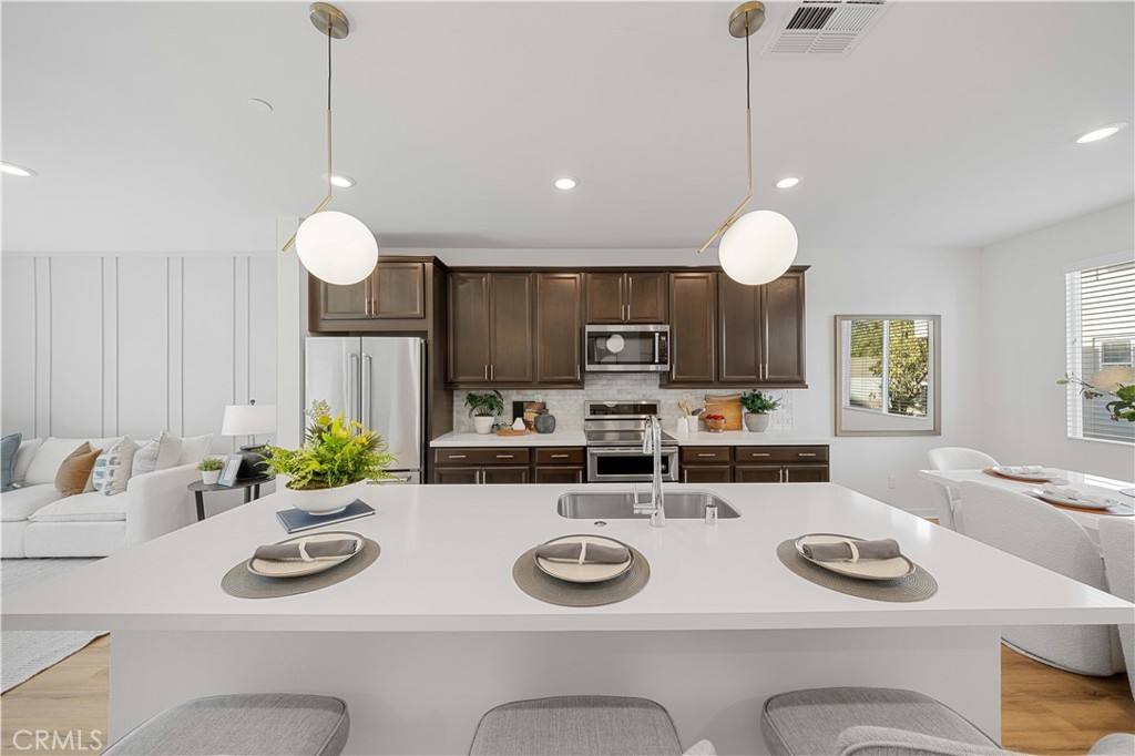 108 Citysquare Irvine, CA 92614 - Photo 16 of 45 a view of kitchen and windows