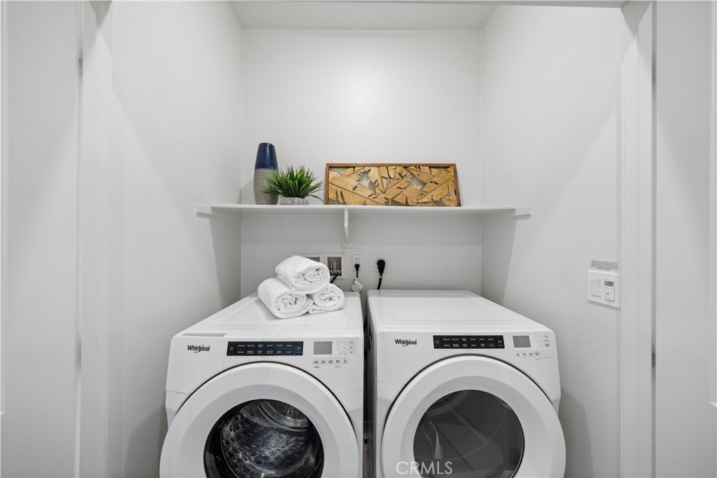 108 Citysquare Irvine, CA 92614 - Photo 26 of 45 a utility room with dryer and washer