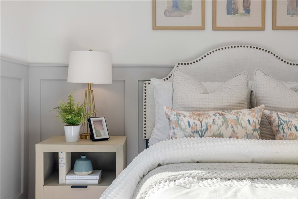 108 Citysquare Irvine, CA 92614 - Photo 34 of 45 a living room with a couch and potted plant