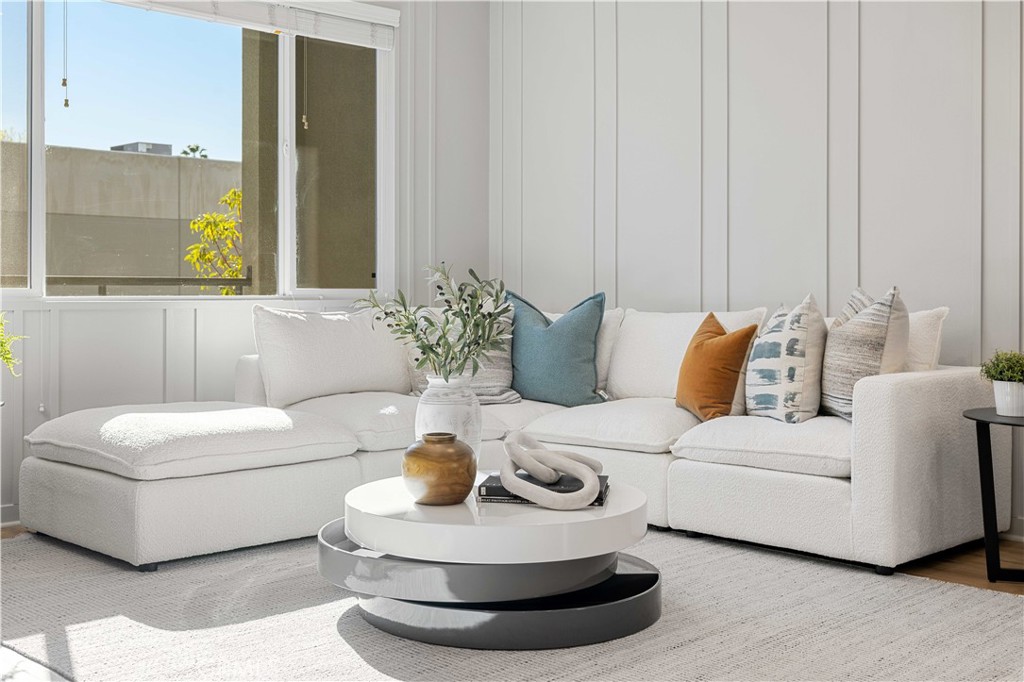 108 Citysquare Irvine, CA 92614 - Photo 35 of 45 a living room with furniture and a potted plant