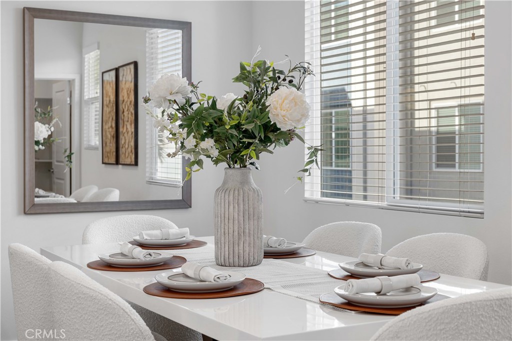 108 Citysquare Irvine, CA 92614 - Photo 38 of 45 a dining room with furniture and window