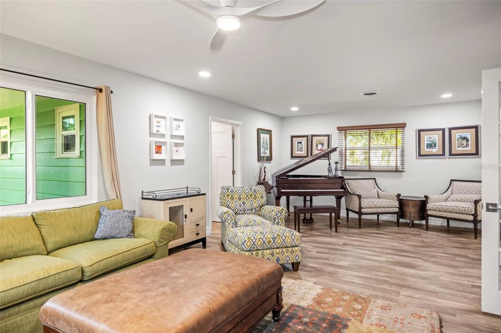 400 Broadway Dunedin, FL 34698 - Photo 17 of 84 a living room with furniture and a large window