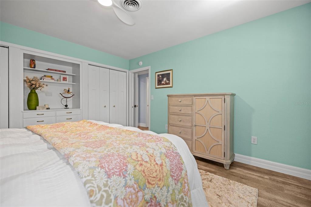 400 Broadway Dunedin, FL 34698 - Photo 51 of 84 a bedroom with a bed and a closet