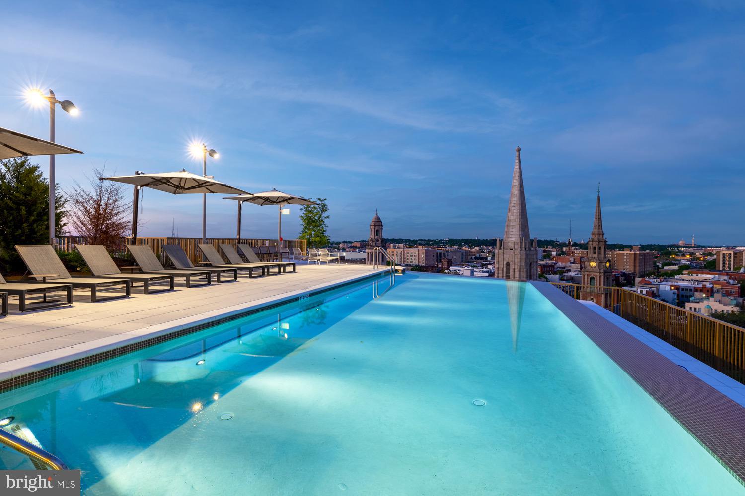 1630 Columbia Road Northwest, Unit 513 Washington, DC 20009 - Photo 18 of 22 a view of a balcony with chairs