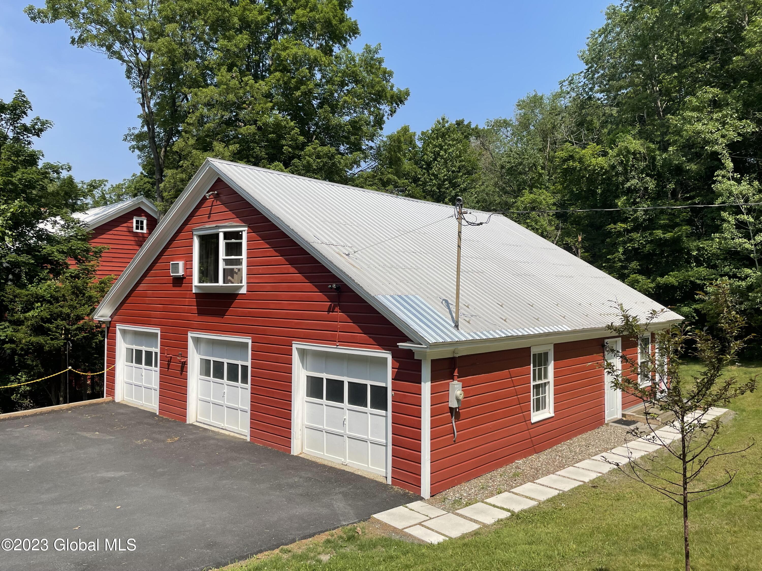 345 Miller Road East Greenbush, NY 12061 - Photo 8 of 10 345 Miller garage side with rope updated
