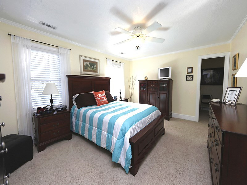 9304 Litchford Road Raleigh, NC 27615 - Photo 14 of 25 Master bedroom features a spacious walk in closet! Master Bedroom