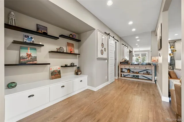 a kitchen with stainless steel appliances kitchen island granite countertop a sink and cabinets