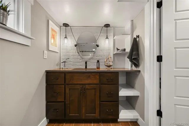 a bathroom with a shower and a toilet
