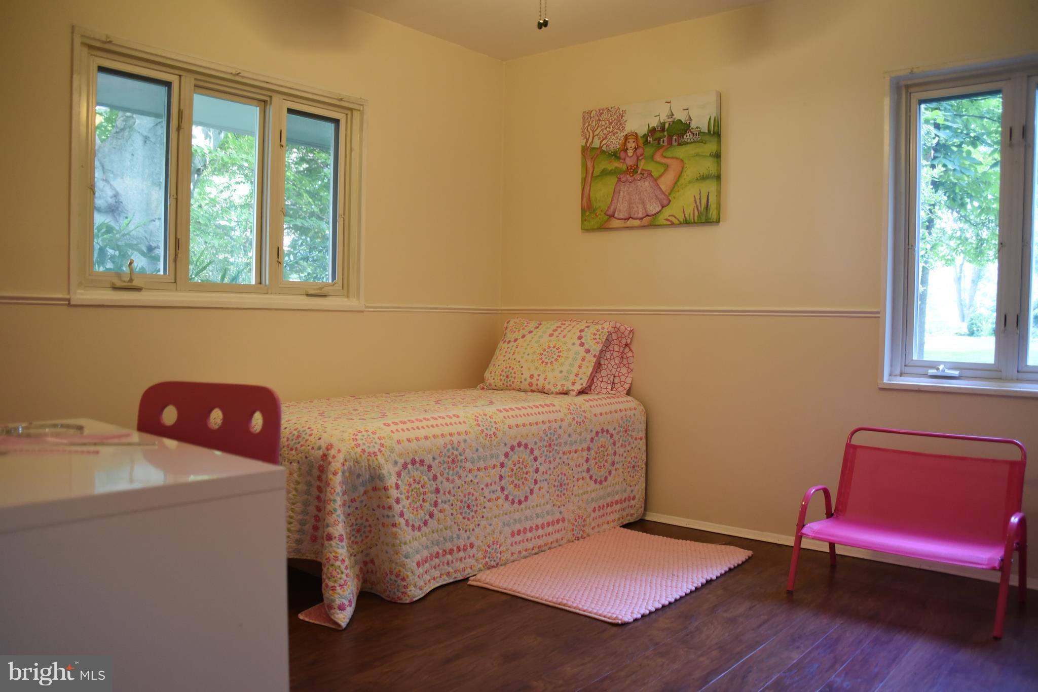 5407 Ferndale Street Springfield, VA 22151 - Photo 11 of 14 a bedroom with a bed and a window