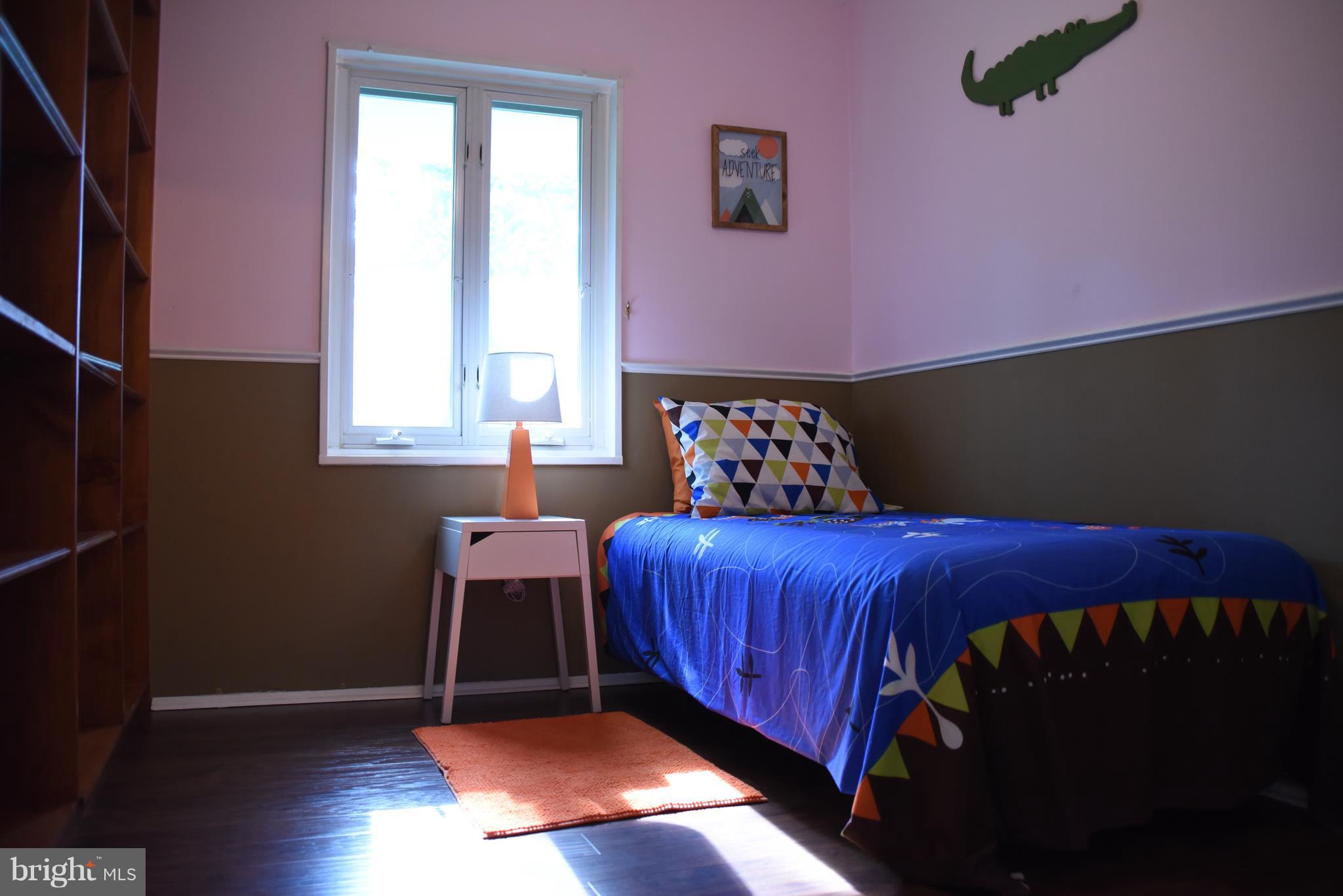 5407 Ferndale Street Springfield, VA 22151 - Photo 12 of 14 a bedroom with a bed and a window