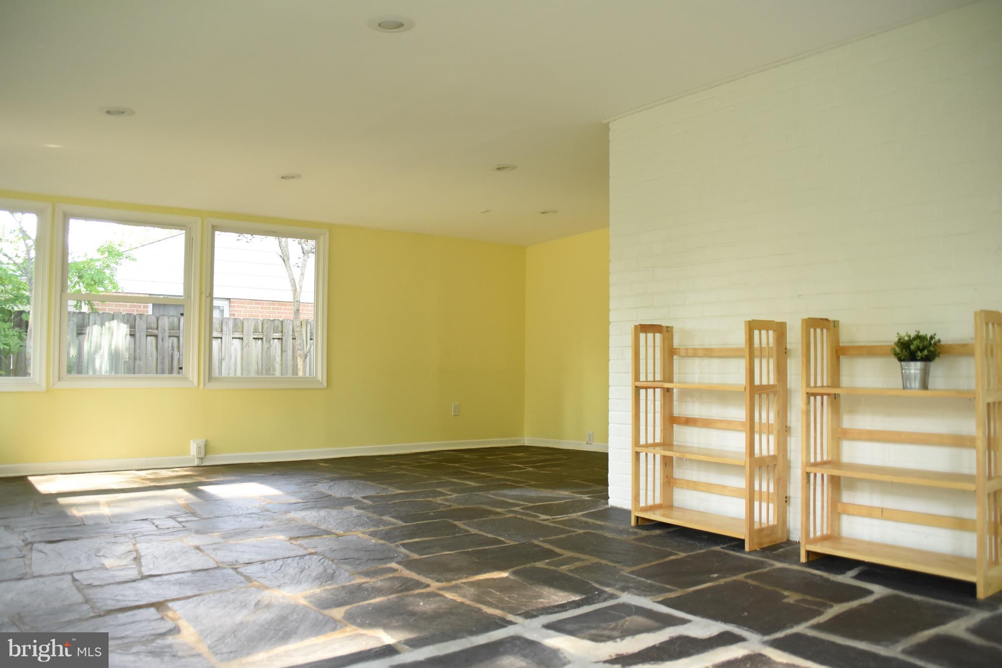 5407 Ferndale Street Springfield, VA 22151 - Photo 7 of 14 a view of front door with wooden floor and door