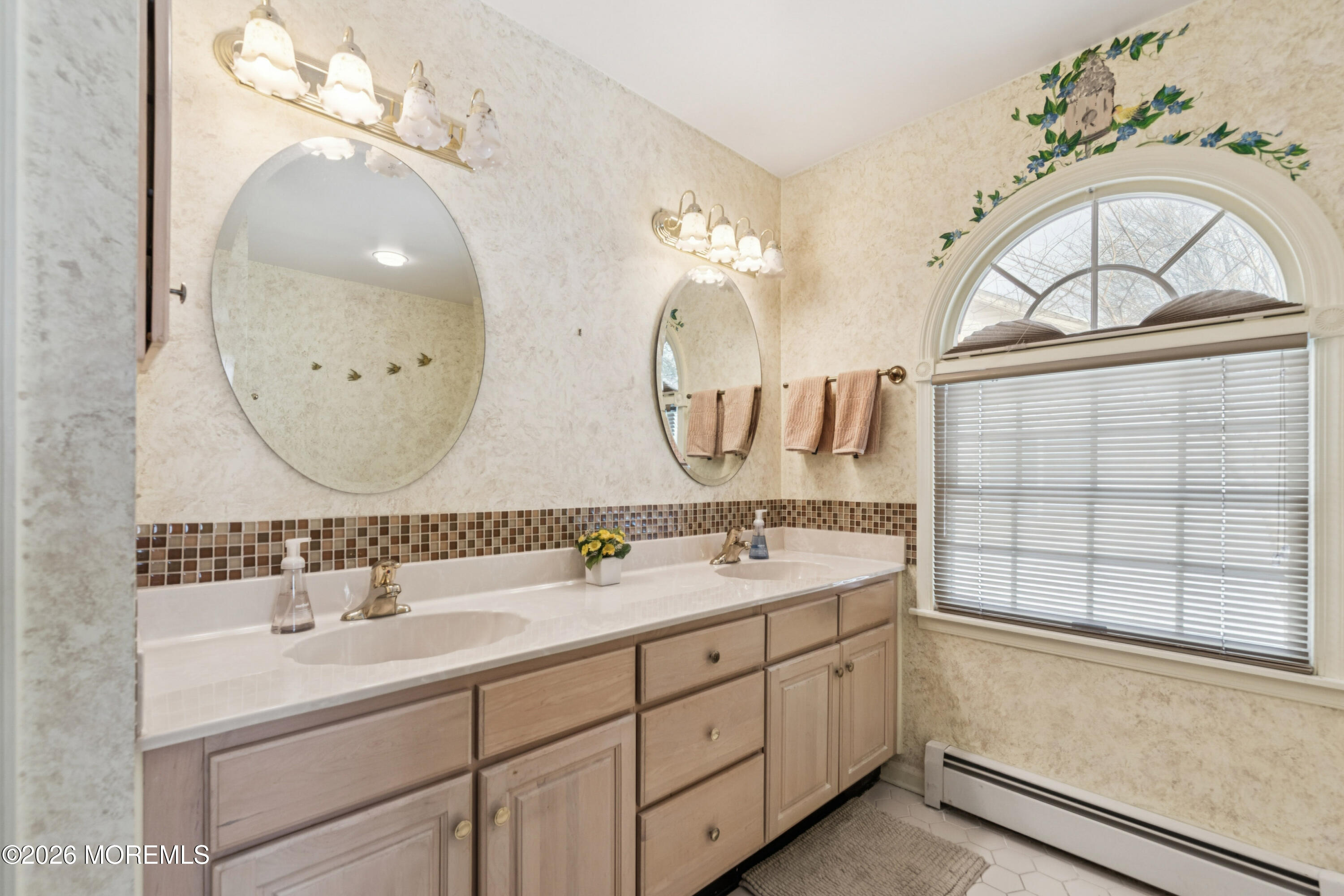 1583 Goldspire Road Toms River, NJ 08755 - Photo 13 of 18 a en suite bathroom with a double vanity sink and a mirror