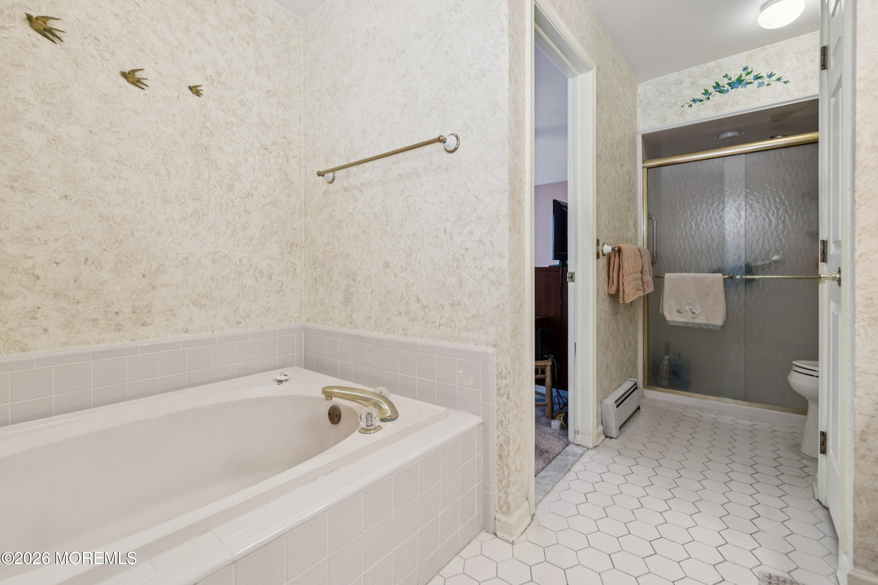 1583 Goldspire Road Toms River, NJ 08755 - Photo 14 of 18 a bathroom with a bathtub and a shower