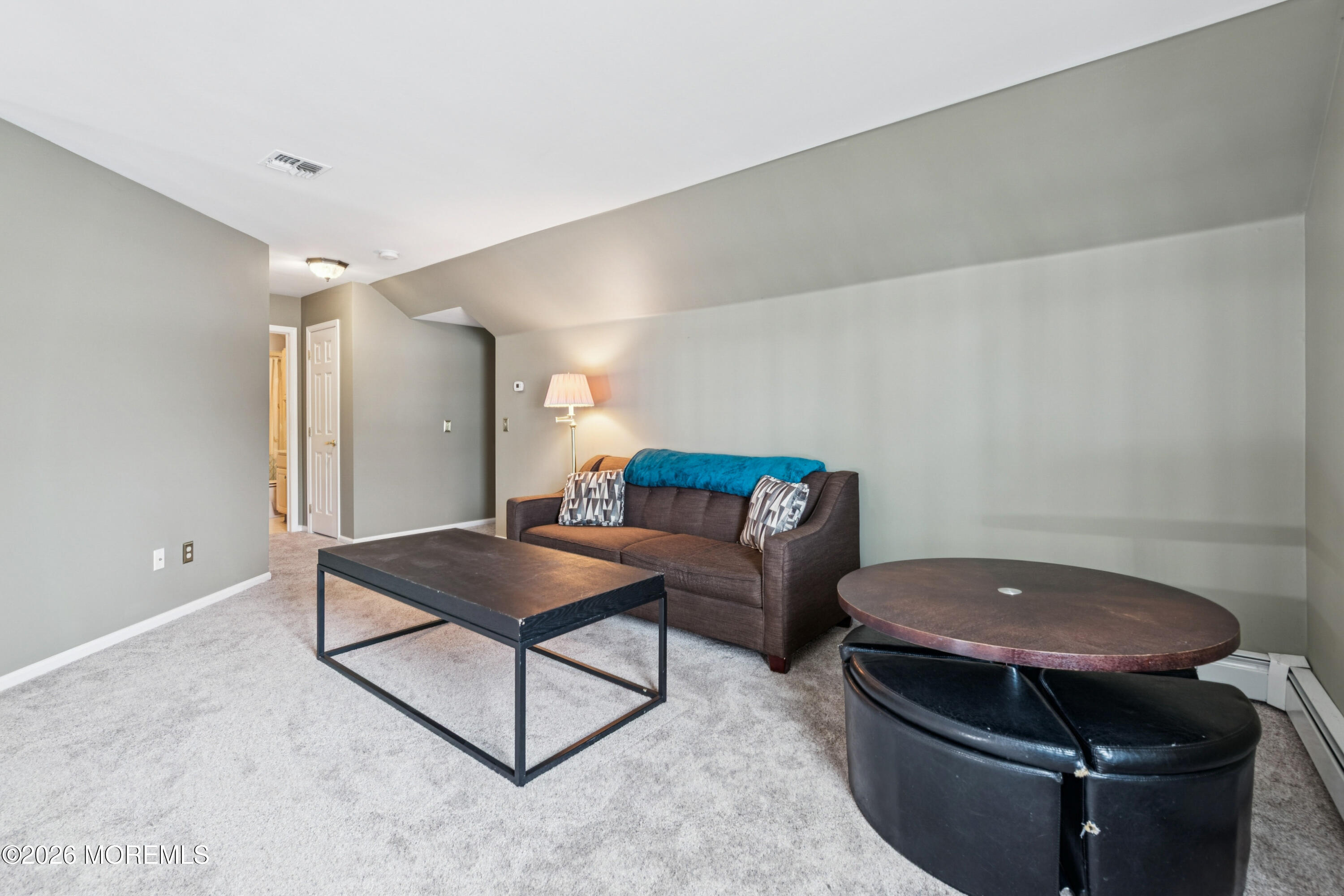 1583 Goldspire Road Toms River, NJ 08755 - Photo 15 of 18 a living room with furniture and a potted plant