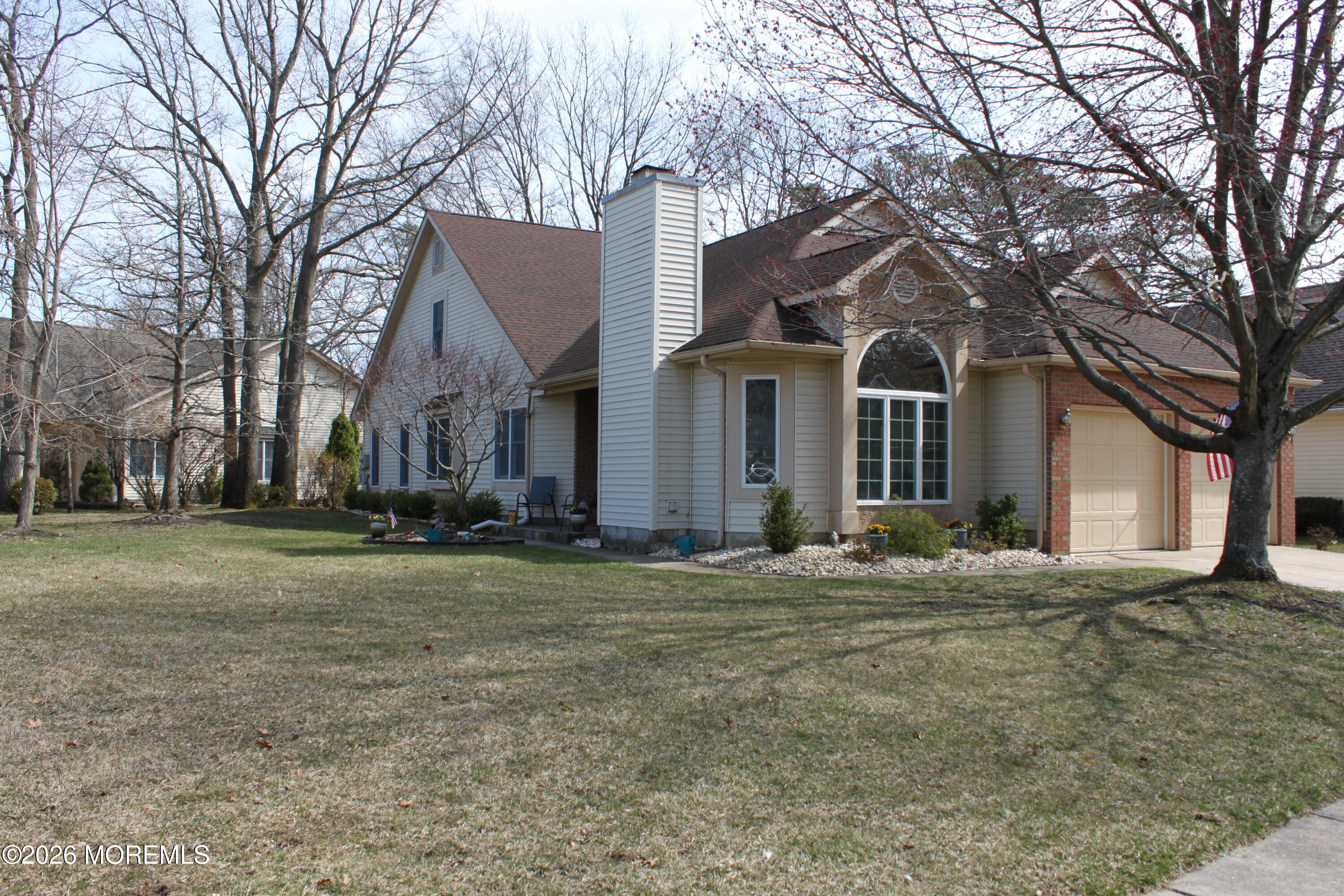 1583 Goldspire Road Toms River, NJ 08755 - Photo 2 of 18 a front view of a house with a yard