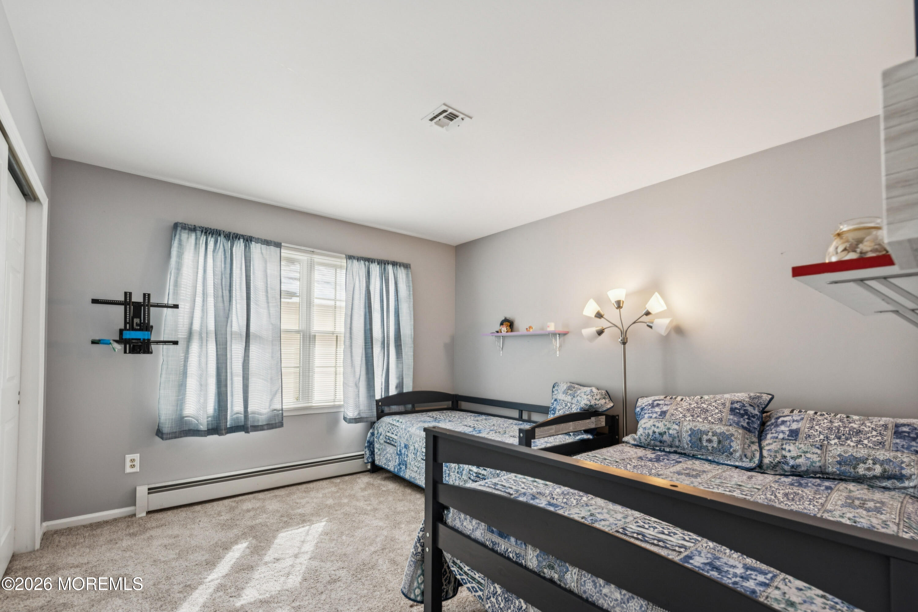 1583 Goldspire Road Toms River, NJ 08755 - Photo 10 of 18 a bedroom with furniture and a window