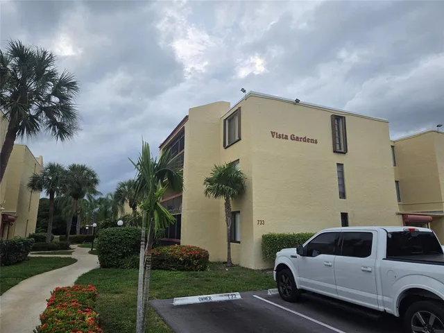 a house view with a garden space