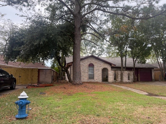 338 Coach Lamp Lane Houston, TX 77060 - Photo 2 of 10 a house with trees in the background