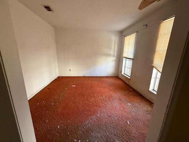 338 Coach Lamp Lane Houston, TX 77060 - Photo 6 of 10 an empty room with windows