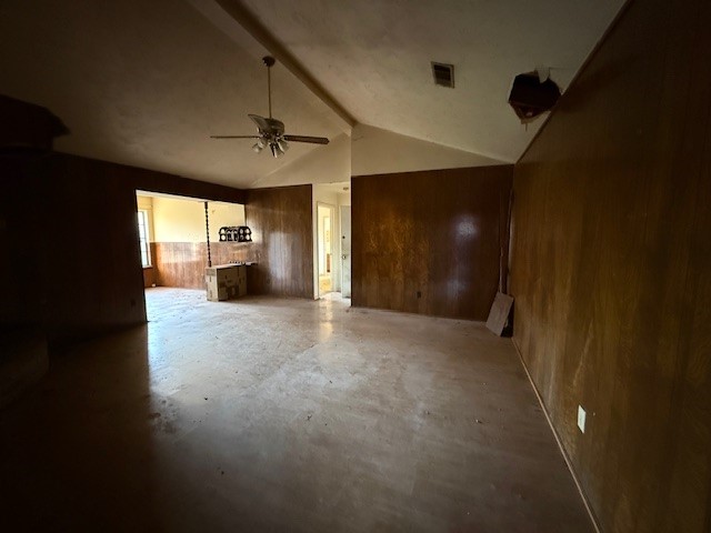 338 Coach Lamp Lane Houston, TX 77060 - Photo 10 of 10 en empty room with windows and a ceiling fan