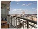a view of a city from a balcony